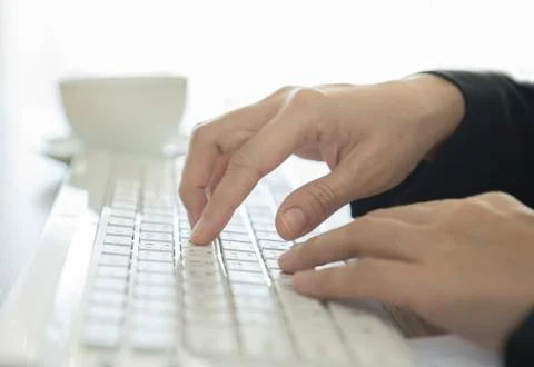 Typing on keyboard Stock Photos