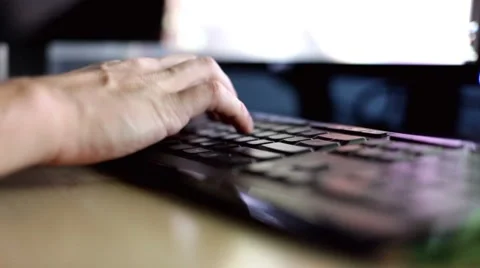 Typing on keyboard shallow depth of field Vídeo Stock 8648650