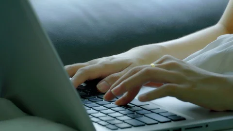 Typing keyboards on laptop devices. Work at home Stock Footage 130048712