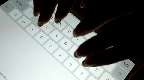 Typing on the keypad of a screen Stock Footage 35364936
