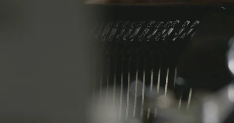 Typing Keys On Inside Of Vintage Typewriter. Close Up Keys Hitting The Paper Stock Footage 123335527