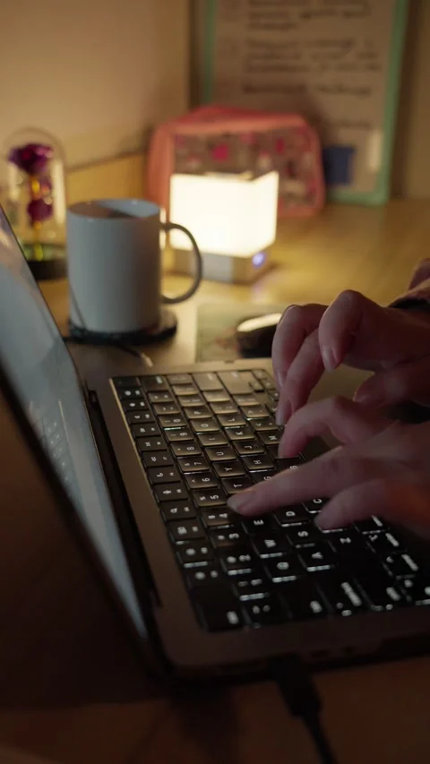 Typing on Laptop and Drinking Coffee at Warm Home Workspace Stock Footage 344950343