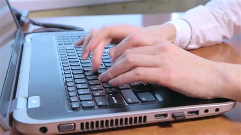 Typing on the laptop and using USB flash drive Stock Footage 45621253