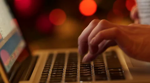 Typing in Laptop before Christmas Stock Footage 57747944