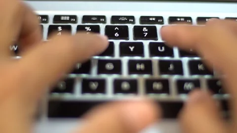 Typing on Laptop with a closeup view Stock Footage 272755436