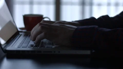 Typing on a Laptop Computer in Dimly lit Room. Stock Footage 84579238