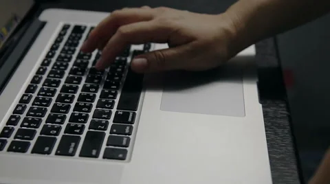 Typing on laptop computer Stock Footage 51202223