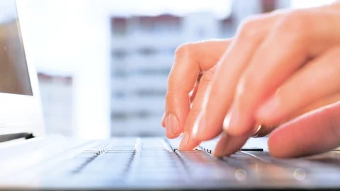 Typing on a laptop computer keyboard. Blind typing on keyboard. Male working at Stock Footage 130148595