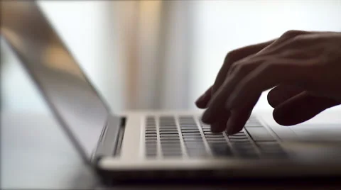 Typing on a laptop computer keyboard HD Stock Footage 48014155