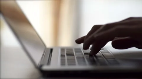 Typing on a laptop computer keyboard HD Stock Footage 48014726