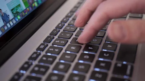 Typing on a laptop computer keyboard HD Stock Footage 48023624