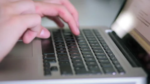 Typing on an Laptop Stock Footage 39996377