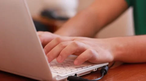 Typing on a laptop Stock Footage 43971074