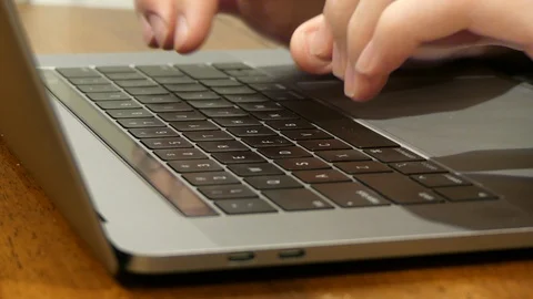 Typing on a laptop Stock Footage 102212962