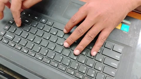 Typing on a laptop Stock Footage 309635974