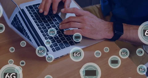 Typing on laptop, hands with floating 6G technology animation in school Stock Footage 304011041