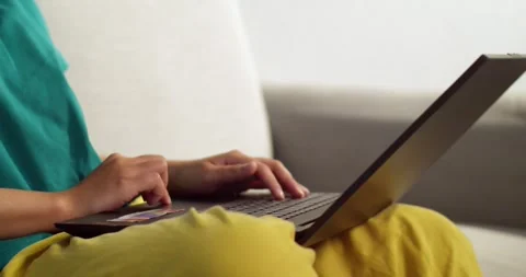 Typing a laptop home office digital workspace cozy environment close-up view Stock Footage 336637583
