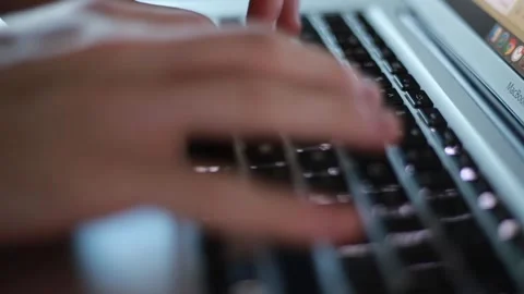 Typing on laptop keyboard close up Stock Footage