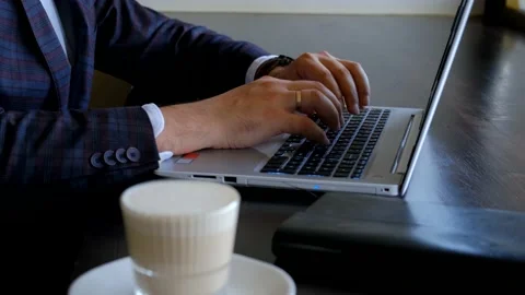 Typing on a laptop keyboard in close-up. Hands typing on computer keys 스톡 동영상 142166459