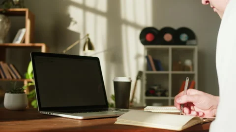 Typing on laptop keyboard close-up. Man with blue hair working in office Stock Footage 172270989