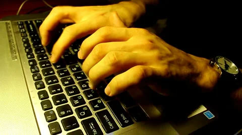 Typing on laptop keyboard Stock Footage 2565638