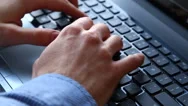 Typing On Laptop Keyboard Stock Footage