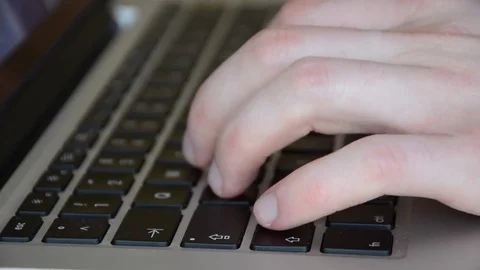 Typing on a laptop keyboard Video stock 81504603