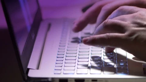 Typing on a laptop keyboard Stock Footage 84431160