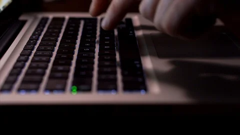Typing on a laptop keyboard Stock Footage 89274405