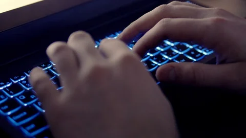 Typing on a laptop keyboard Video stock 127936595