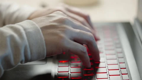 Typing on a laptop keyboard Stock-Footage 164317562