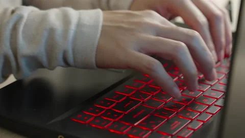 Typing on a laptop keyboard Stock-Footage 164318099