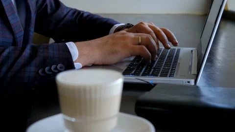 Typing on laptop keyboard. Hands typing on computer keys. Slow motion Stock Footage 142508779