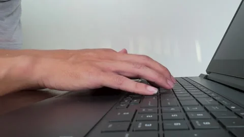 Typing on Laptop Keyboard in Office Setting Closeup Vidéo 311793701