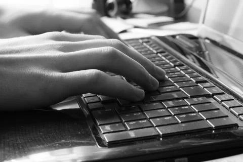 Typing On A Laptop Keyboard Stock Photos