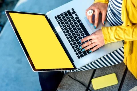 Typing on laptop keyboard Stock Photos