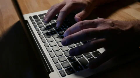Typing on Laptop. Mysterious Stock-Footage 44479396