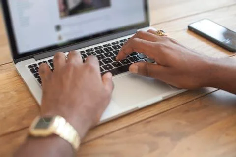 Typing On Laptop Stock-Fotos