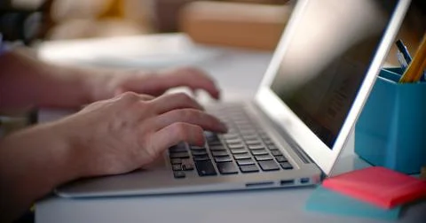 Typing on laptop Stock Photos