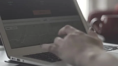 Typing on a laptop. They work in the office. Work in the office. Stock Footage 130225498