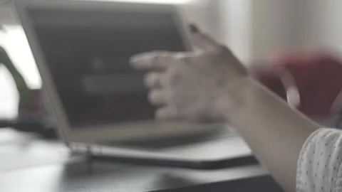 Typing on a laptop. They work in the office. Work in the office. Stock Footage 130225526