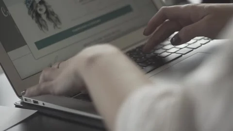 Typing on a laptop. They work in the office. Work in the office. Stock Footage 130225583