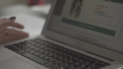 Typing on a laptop. They work in the office. Work in the office. Stock Footage 130225622