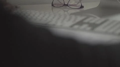Typing on a laptop. They work in the office. Work in the office. Stock Footage 130226107