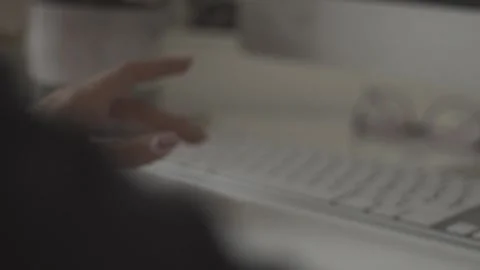 Typing on a laptop. They work in the office. Work in the office. Stock Footage 130226787