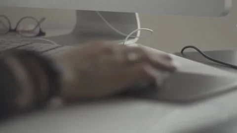 Typing on a laptop. They work in the office. Work in the office. Stock Footage 130227219