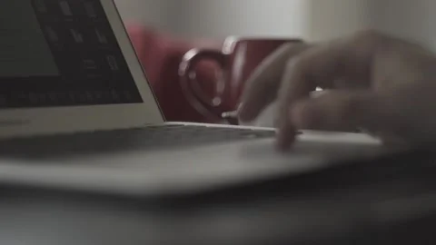 Typing on a laptop. They work in the office. Work in the office. Stock Footage 130227300
