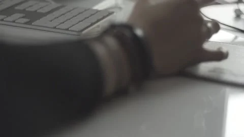 Typing on a laptop. They work in the office. Work in the office. Stock Footage 130227812