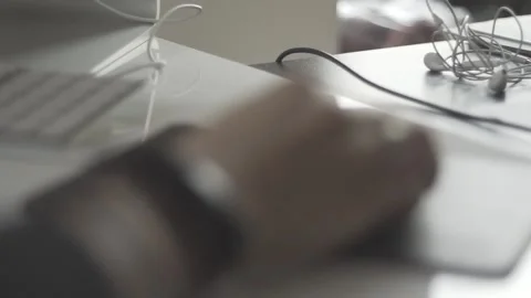 Typing on a laptop. They work in the office. Work in the office. Stock Footage 130228078