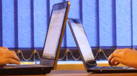 Typing on Laptops Video stock 30428165